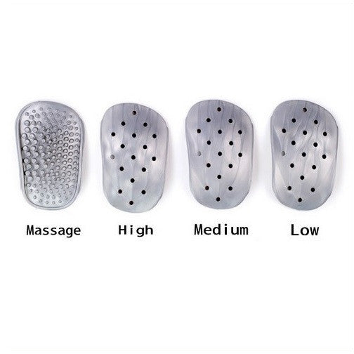 Visar hela uppsättningen av innersulan inklusive massageinsats med knölar som masserar foten vid gång